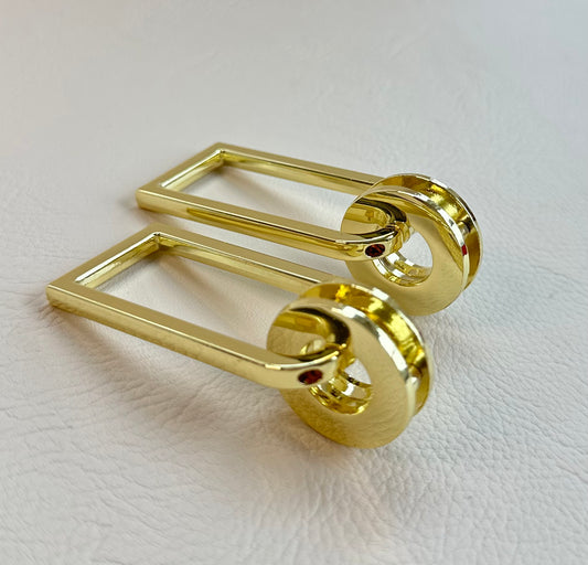 2 Grommet strap connectors in Gold