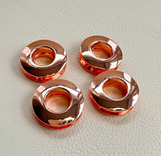 4 Reversible "force fit" grommets in Rose Gold