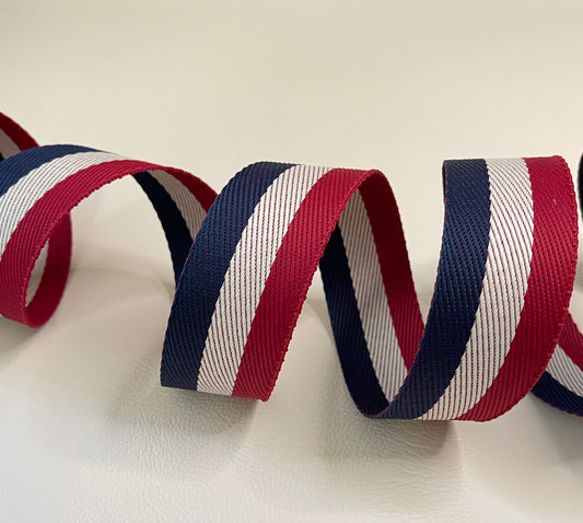 1 5/8" wide Red, cream and blue stripe webbing